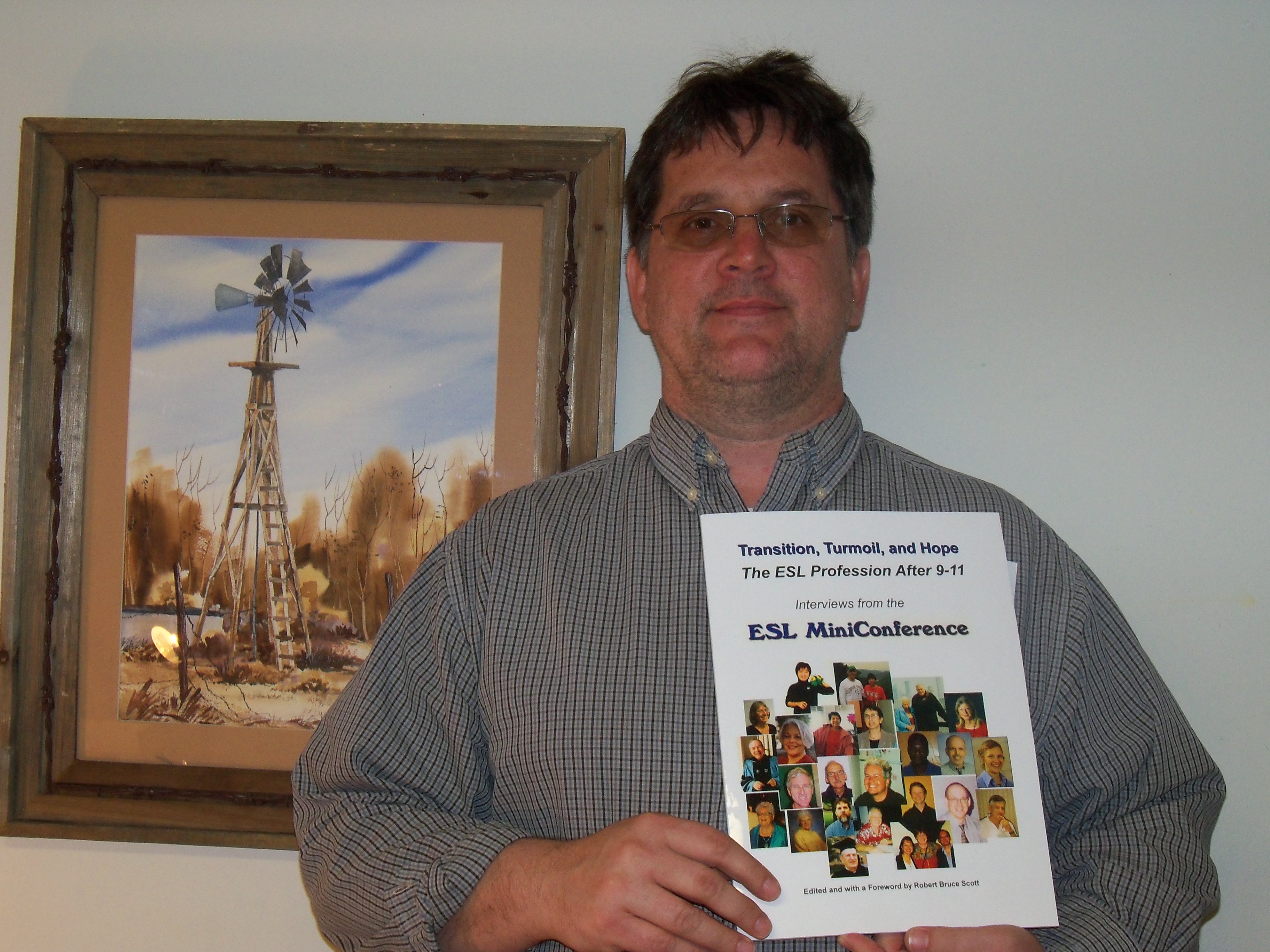 Dr. Robert Bruce Scott with his favorite painting and his favorite book