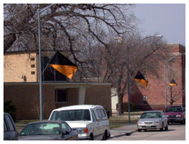 Fort Hays colors, black and gold, are flown for special occasions