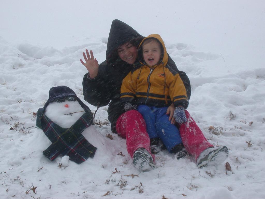 Meribel and Bill with snowman, Dec. 17, 2005