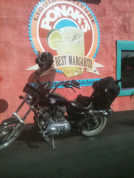 Photo of Kirk's Harley parked at his favorite Kansas City restaurant