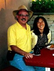 Photo from his Web site of Harold Melville with his wife, Keiko