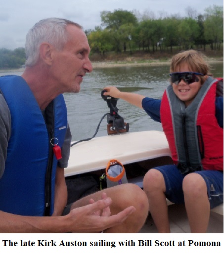 A close and lifelong family friend Kirk Auston showing a young William John Scott how to steer the boat, at Pomona Lake